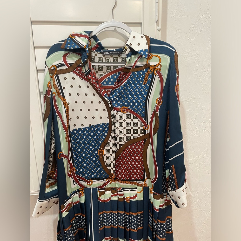 Printed dress with pleated bottom